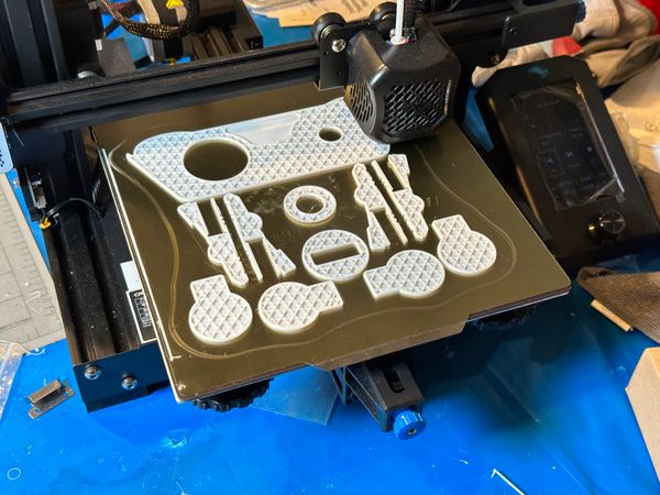 3D printing pieces of a BD-1 Star Wars droid on an Ender 3 v2